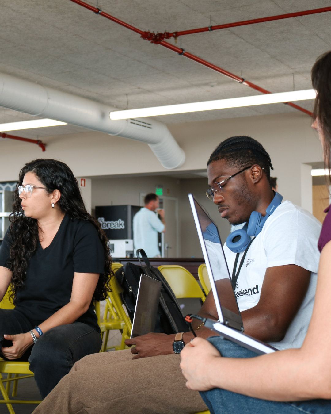 Elio Fernandes working on BetweenUs during Startup Weekend Porto